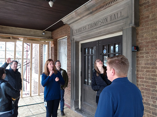 On the porch of Charles Thompson Memorial Hall