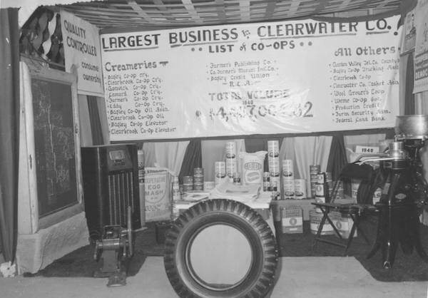 Display with sign-LARGEST BUSINESS in CLEARWATER CO. list of Coops