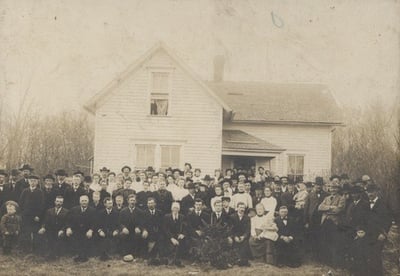 New Sweden Creamery customers gathered in front of butter maker John Solle’s home, c.1903