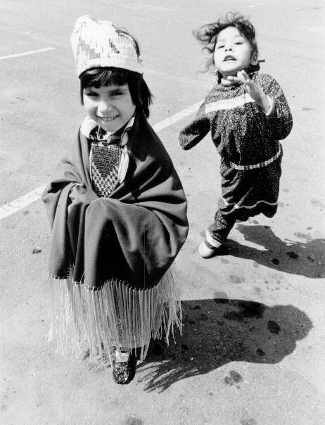 Native American children dancers wearing traditional clothes