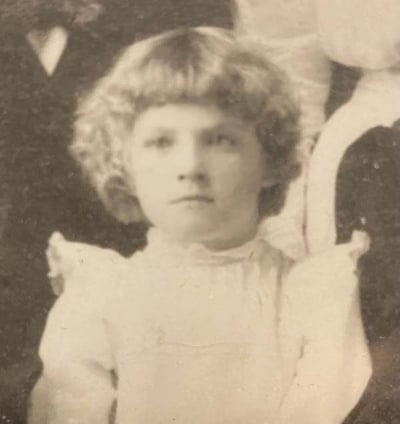 vintage head and shoulders photo of a girl in white dress
