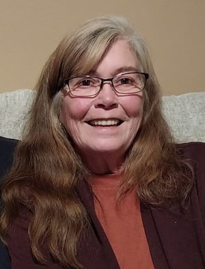 Head and shoulders photo of Mary Ostby