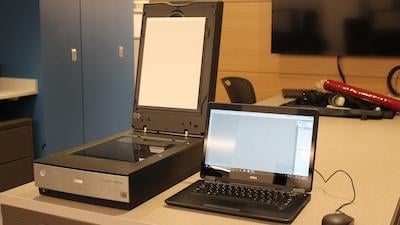 Photo of scanner and laptop