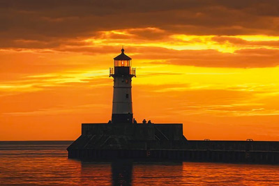 Historic Duluth Harbor North Pierhead Lighthouse with sun setting
