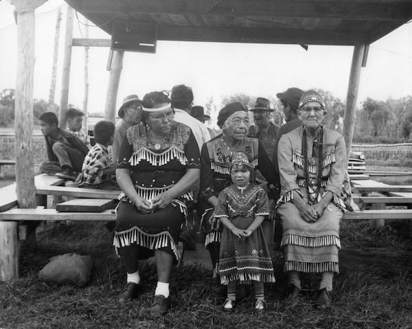 Jingle Dress Dancers at Red Lake Fair, 1952-Three older women and one small child