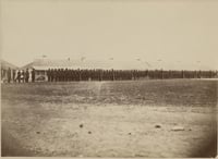 Second Minnesota Volunteer Infantry standing in front of the Long Barracks