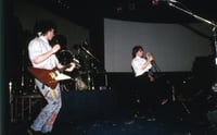 Color image of U2 performing at First Avenue, February 21, 1982. Photograph by Steven Laboe.