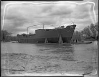 Black and white photograph of the launching of the Agawam at Savage, 1943. Photograph by Minneapolis Star Journal.