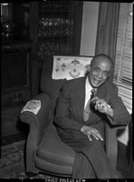 S. Edward Hall of St. Paul sitting for a portrait. ca. 1940.