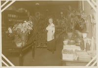 Carrie H. Lippincott in her flower shop