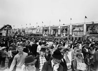 Black and white photograph of crowds at the Midway, Minnesota State Fair, 1963,