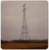 Workers finish connecting the upper and lower portions of a high-voltage power-line tower in Grant County, Minnesota, 1976–1978.