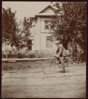 Theodore Palmer on a bicycle