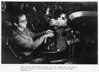 Sound engineer and sound effects man Tom Keith and Lynne Cruise mix sound during a performance of A Prairie Home Companion at the Fitzgerald Theater, ca. 1985.