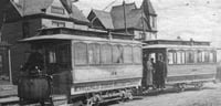 Black and white photograph of the first electric street cars in Minneapolis, c.1889.