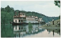 Minnesota Centennial Showboat being towed