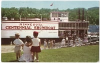Theater-goers boarding the Minnesota Centennial Showboat on the East Bank River Flats below the University of Minnesota Campus, 1970.