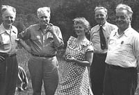 Black and white photograph of Vincent Dunne (left), James P. Cannon (center), and Arne Swabeck (right) in Los Angeles, August, 1954.