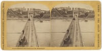 Black and white photo negative of the Hennepin Avenue Bridge, c.1868.