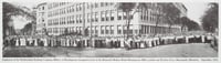 Employees of the Northwestern Knitting Company, makers of Munsingwear, grouped in front of the Mammoth Modern Model Munsingwear Mills, Lyndale and Western Avenues, Minneapolis