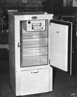Black and white photograph of an electric refrigerator, 1931.