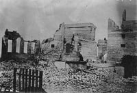 Black and white photograph of scene in Cloquet after the fire, 1918.
