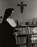 Black and white photograph of Alice Gustava Smith (Sister Maris Stella) in her office at the College of St. Catherine, c.1970.
