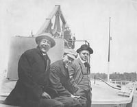 Governor John A. Johnson with two unidentified men