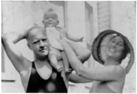 Black and white photograph of Delos and Maud Hart Lovelace with daughter Merion, c.1931.