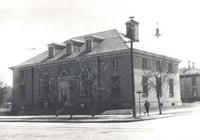 Black and white photograph of the Anoka Post Office, located on the south-east corner of Main Street and Third Avenue, undated.