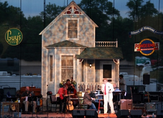 : Garrison Keillor and the Guy’s All-Star Shoe Band on stage at the 2011 Minnesota State Fair before a live performance.