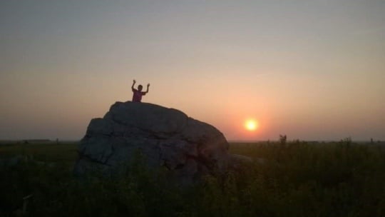 Color image of the Eagle Rock at sunset, 2014. From the photograph collection of the Minnesota Department of Natural Resources.