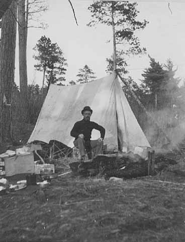Black and white photograph of Outdoor activities at Itasca State Park, 1898.