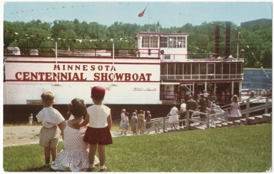 Theater-goers boarding the Minnesota Centennial Showboat on the East Bank River Flats below the University of Minnesota Campus, 1970.