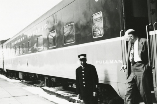 Black and white photograph of Pullman porter Dewey Jackson, c.1955.