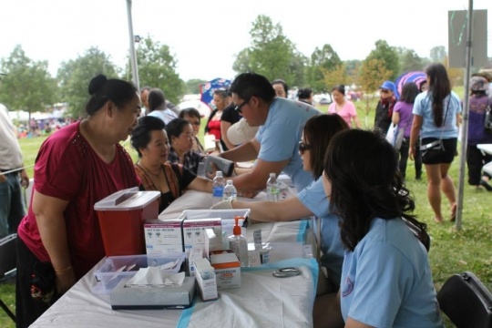 Color image of Hmong Health Care Professional Coalition Health Fair, 2013.