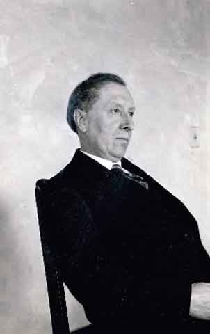 Black and white photograph of Joseph Gilbert seated, c.1925.