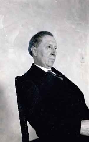 Black and white photograph of Joseph Gilbert seated, c.1925.