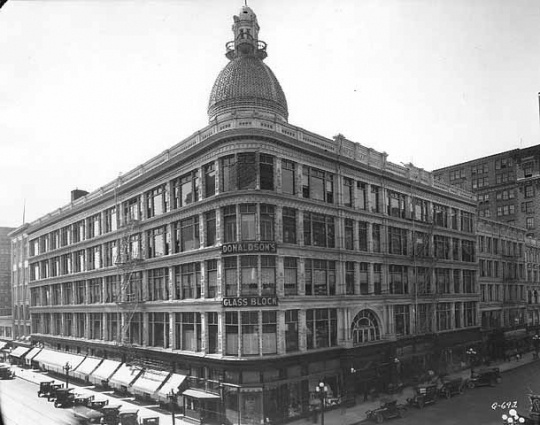 Black and white photograph of Donaldson’s Glass Block, c.1920. Photograph by Charles P. Gibson.