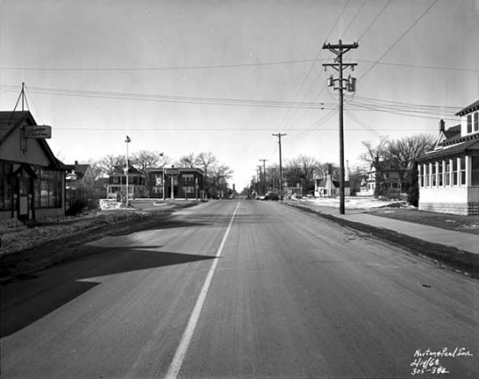 Black and white photograph of East 38th St near Portland Ave, Minneapolis, 1968.