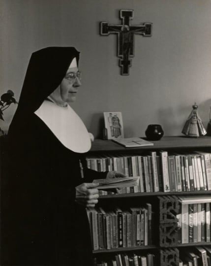 Black and white photograph of Alice Gustava Smith (Sister Maris Stella) in her office at the College of St. Catherine, c.1970.
