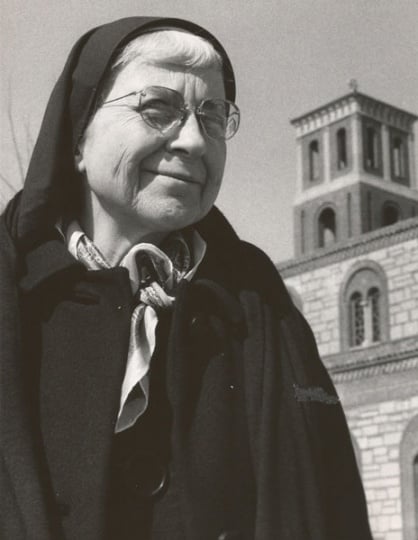 Black and white photograph of Alice Gustava Smith (Sister Maris Stella) at Our Lady of Victory Chapel on the campus of the College of St. Catherine, c.1970.