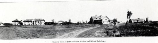 Black and white photograph of the Northwest Experiment Station and Northwest School of Agriculture grounds and buildings,1910.