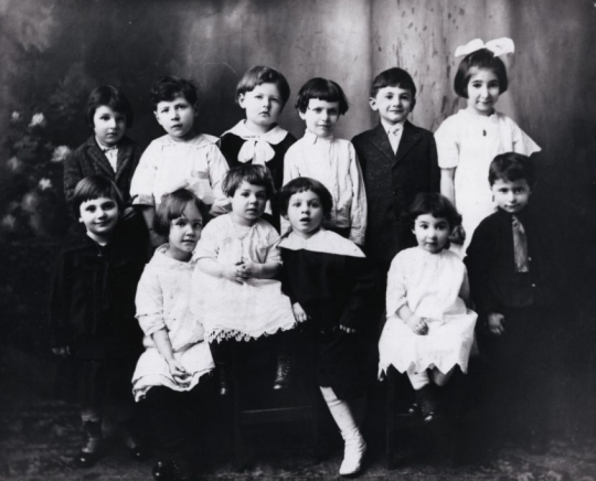 Black and white photograph of children attending a child's birthday party c.1912.