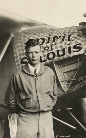 Black and white photograph of Charles Augustus Lindbergh with the Spirit of St. Louis, c.1928.