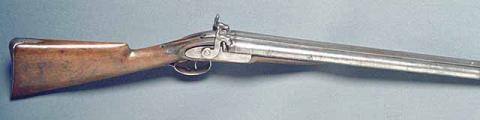 Belgian double-barreled percussion shotgun.